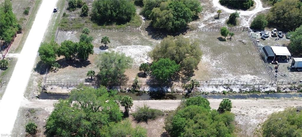 180 North Datil Street Clewiston, FL 33440 - Photo 2 of 11 an aerial view of residential house with outdoor space