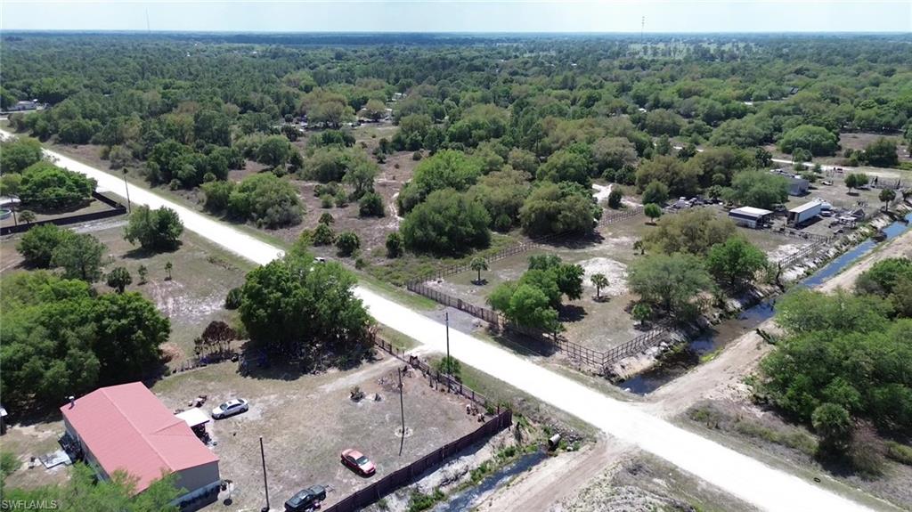 180 North Datil Street Clewiston, FL 33440 - Photo 7 of 11 an aerial view of a house with a yard