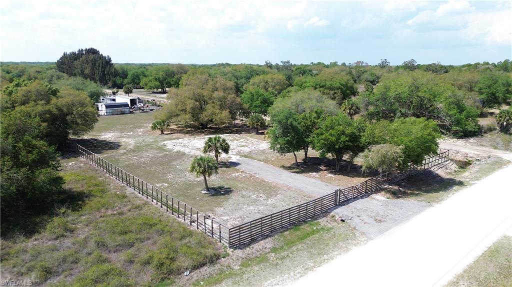 180 North Datil Street Clewiston, FL 33440 - Photo 9 of 11 an aerial view of a house with mountain view