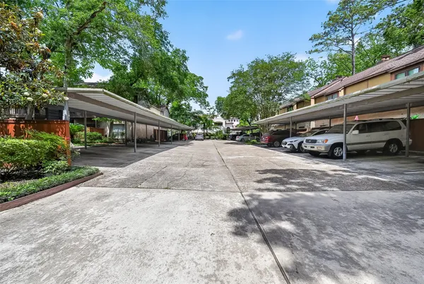a view of street with parked cars
