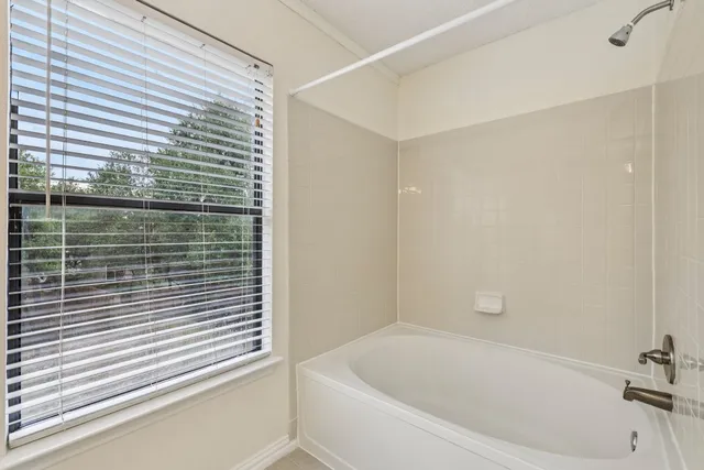 a bathroom with a bathtub