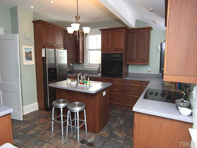 706 North East Street Raleigh, NC 27604 - Photo 6 of 14 Another view of comfortable kitchen. Refrigerator conveys. Kitchen