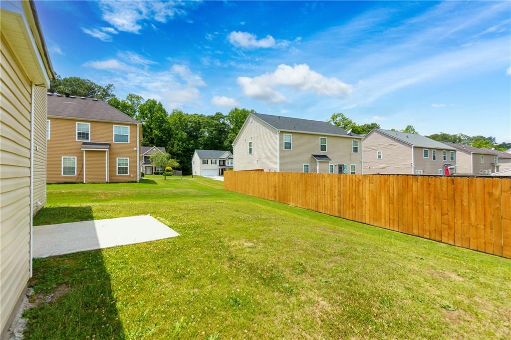 375 Walton View Fairburn, GA 30213 - Photo 29 of 38 a view of swimming pool with a yard