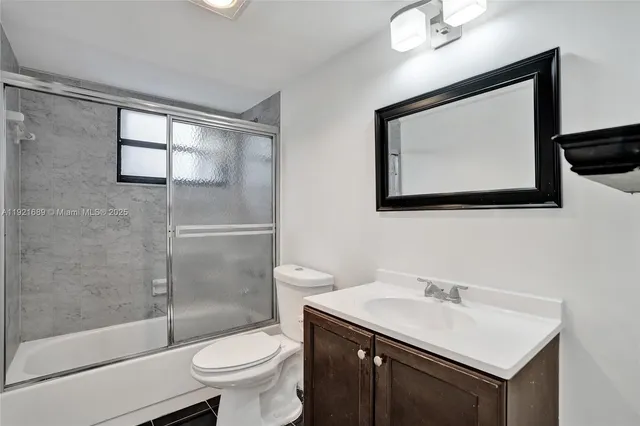a view of livingroom with hardwood floor and hallway
