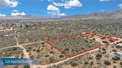 a view of a dry area with mountain view