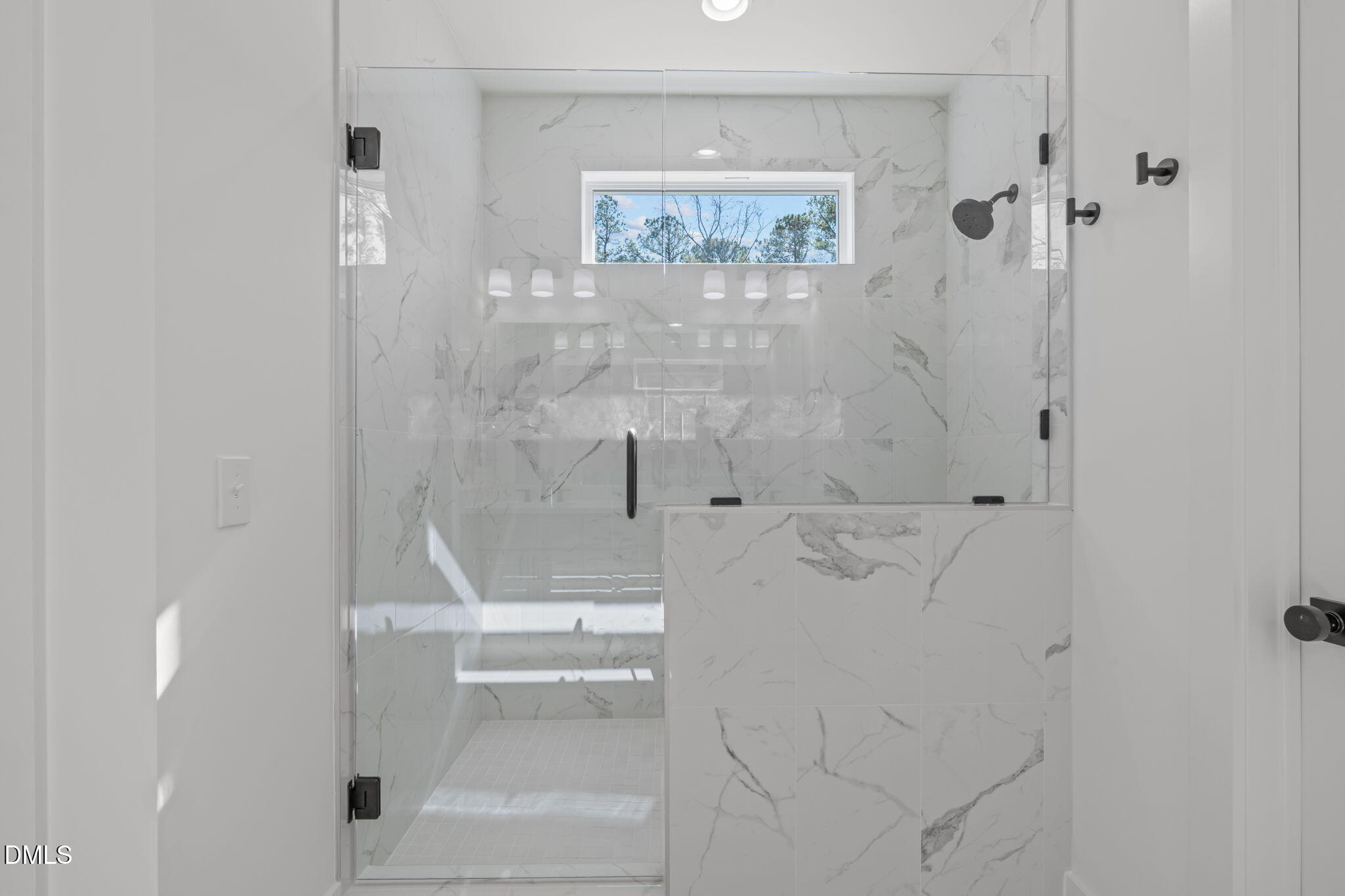 637 Conover Road, Unit B Durham, NC 27703 - Photo 29 of 52 a bathroom with a shower