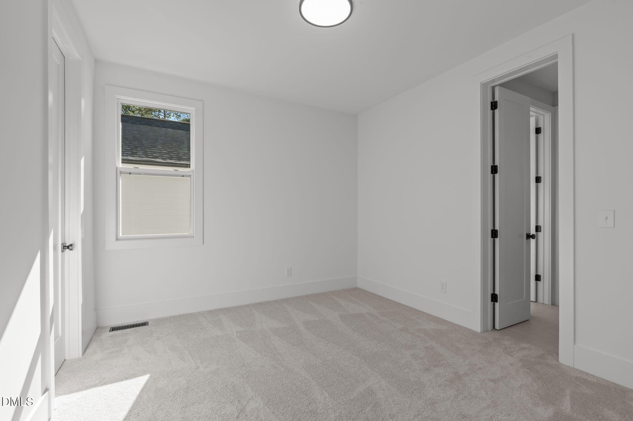 637 Conover Road, Unit B Durham, NC 27703 - Photo 35 of 52 a view of an empty room with closet area