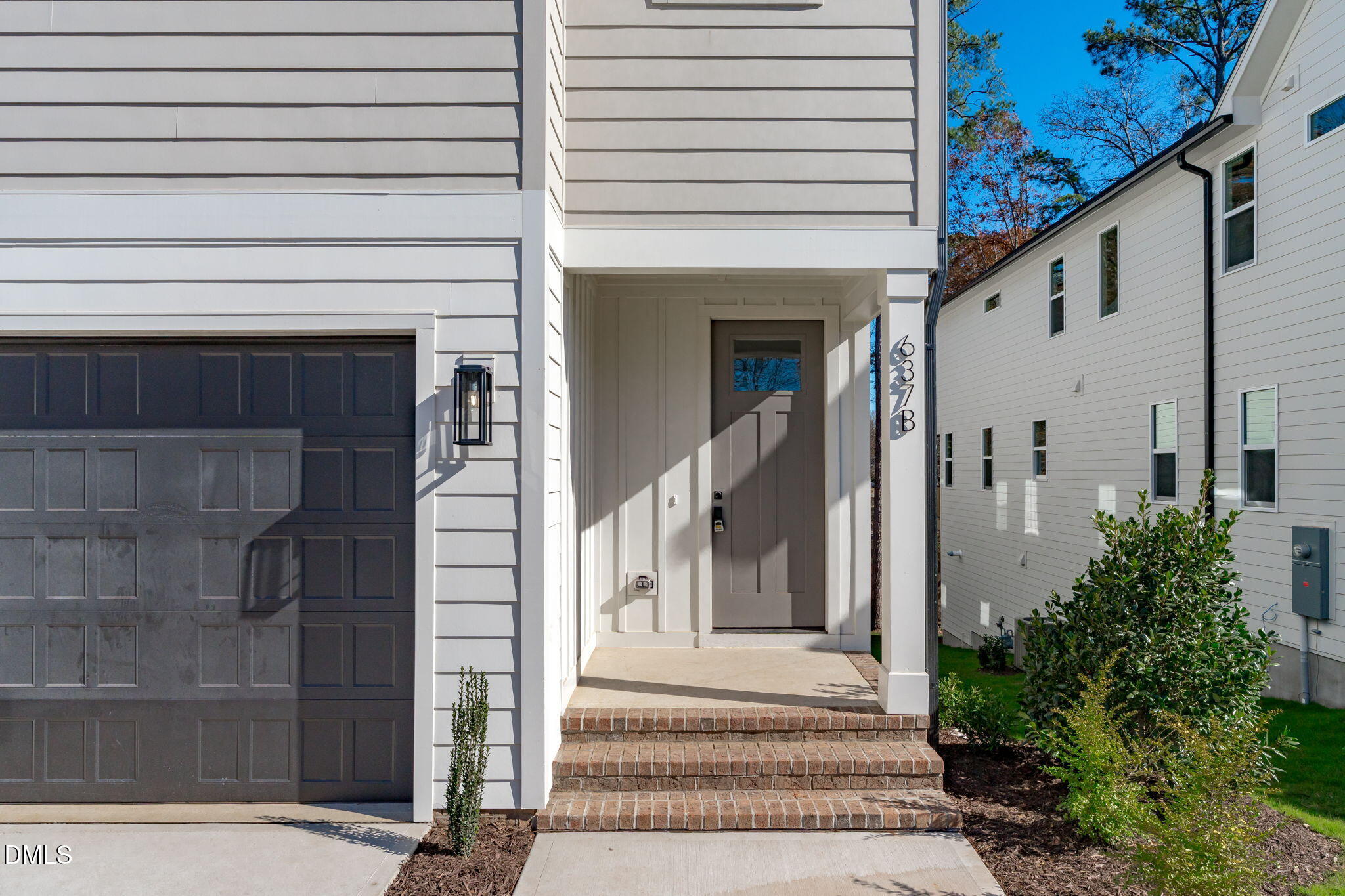 637 Conover Road, Unit B Durham, NC 27703 - Photo 6 of 52 a front view of a house with a outdoor space