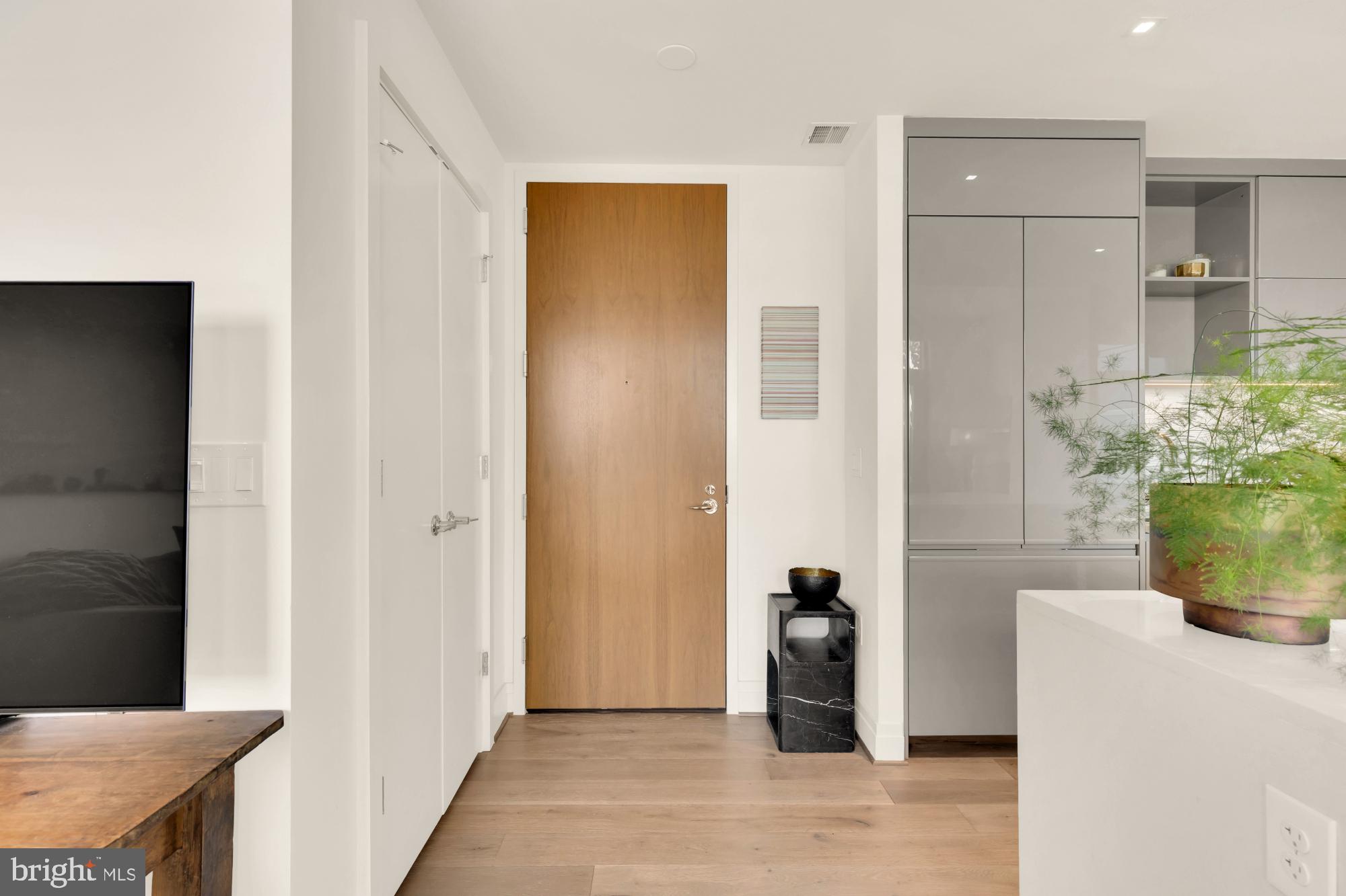810 O Street Northwest, Unit 901 Washington, DC 20001 - Photo 6 of 38 a view of a hallway with dining area