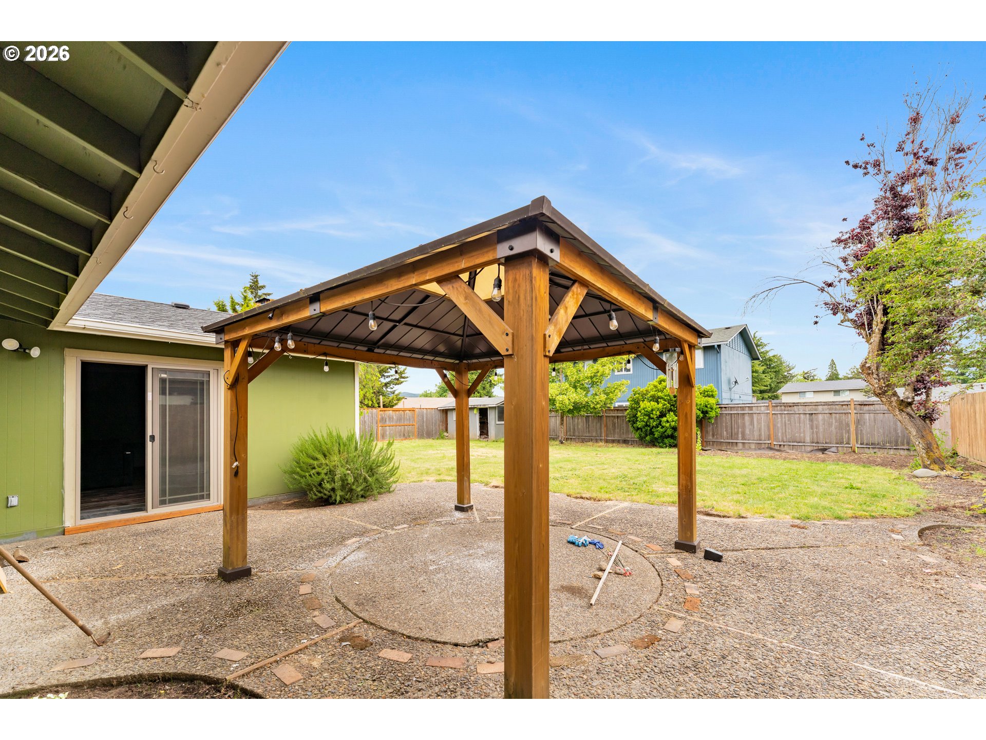 1735 Rainbow Drive Springfield, OR 97477 - Photo 17 of 17 a view of a house with backyard and porch