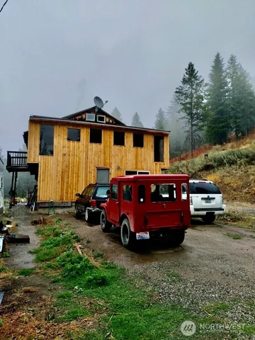a car parked in front of a house
