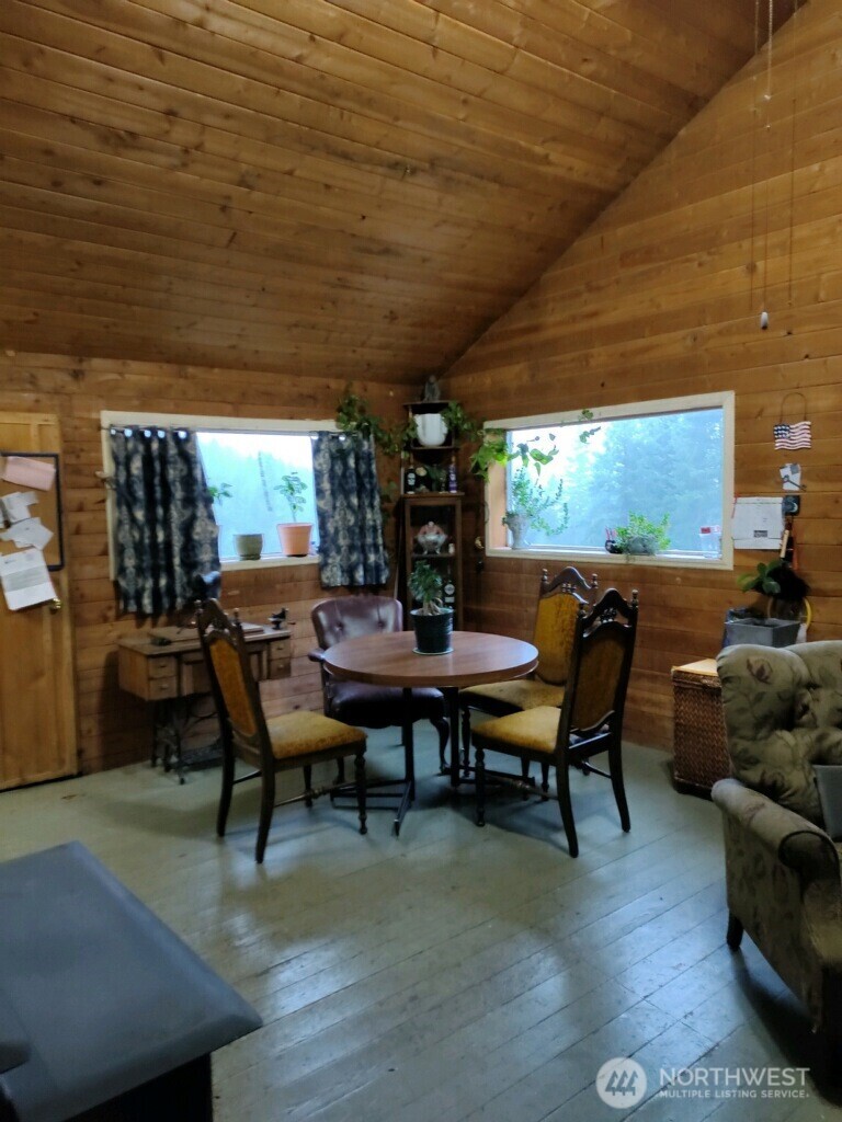57 Slippery Hill Lane Republic, WA 99166 - Photo 9 of 32 a view of a dining room with furniture window and outside view