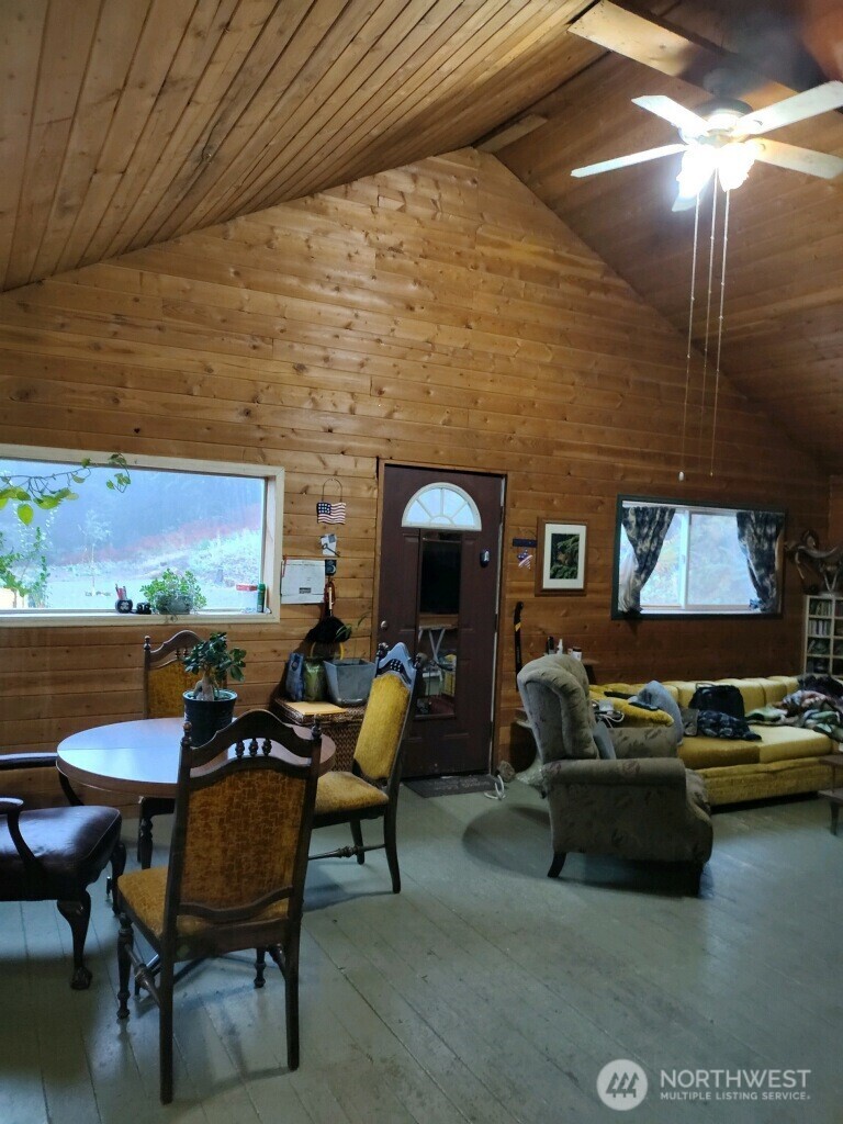 57 Slippery Hill Lane Republic, WA 99166 - Photo 10 of 32 a outdoor living space with furniture and a fireplace
