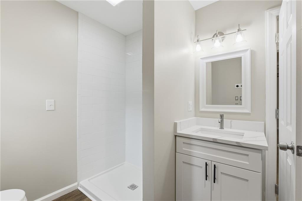 151 Richardson Street Toccoa, GA 30577 - Photo 17 of 48 a bathroom with a sink and a mirror