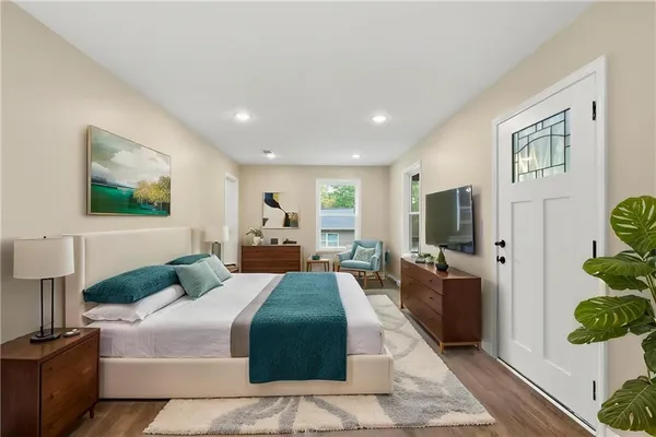 a view of wooden house with a large window