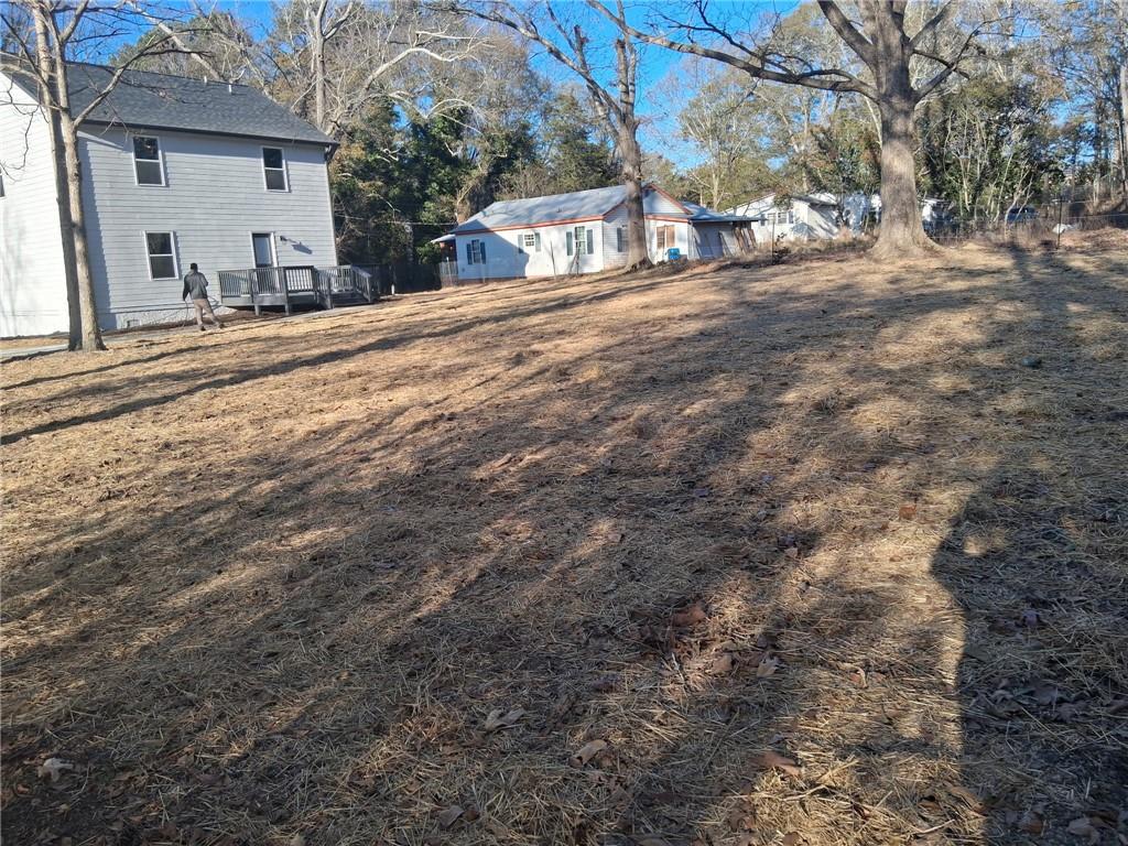 151 Richardson Street Toccoa, GA 30577 - Photo 38 of 48 a front view of a house with a yard and garage