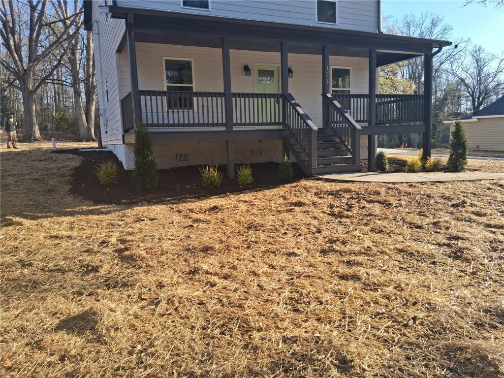151 Richardson Street Toccoa, GA 30577 - Photo 5 of 48 a front view of a house with garden