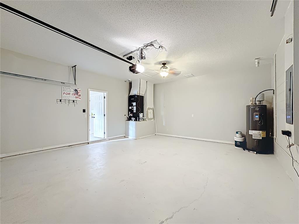 312 Towhee Road Winter Haven, FL 33881 - Photo 44 of 45 en empty room with ceiling fan and window