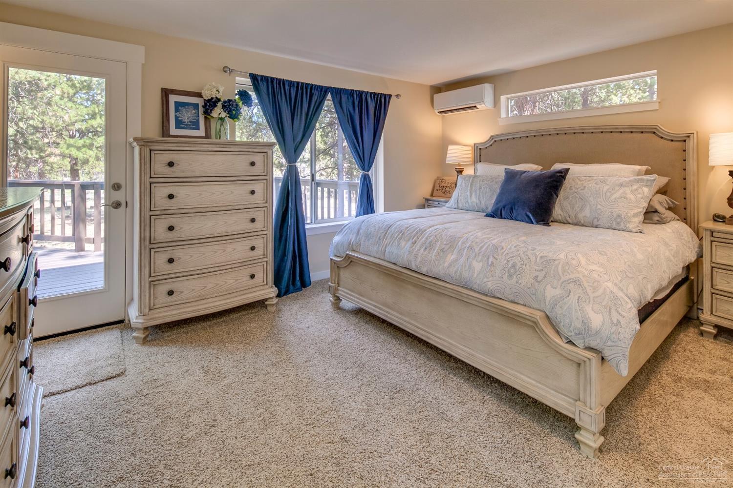 60175 Cheyenne Road Bend, OR 97702 - Photo 10 of 24 a bedroom with a bed and a window