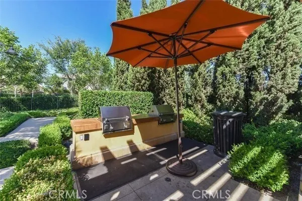 a view of a patio with furniture