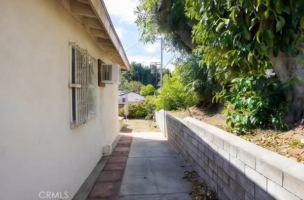 a view of balcony and yard