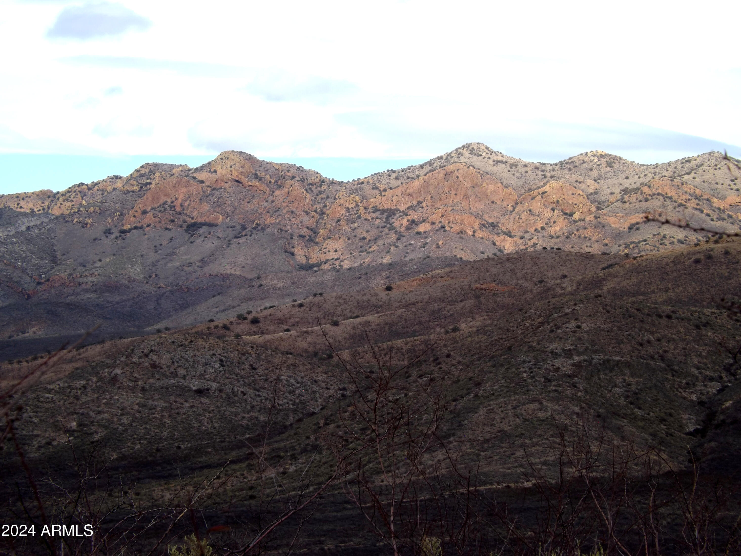 Lot 2 West Red Mountain Road, Unit 2 Bisbee, AZ 85603 - Photo 9 of 14 a view of a dry space with mountains in the background
