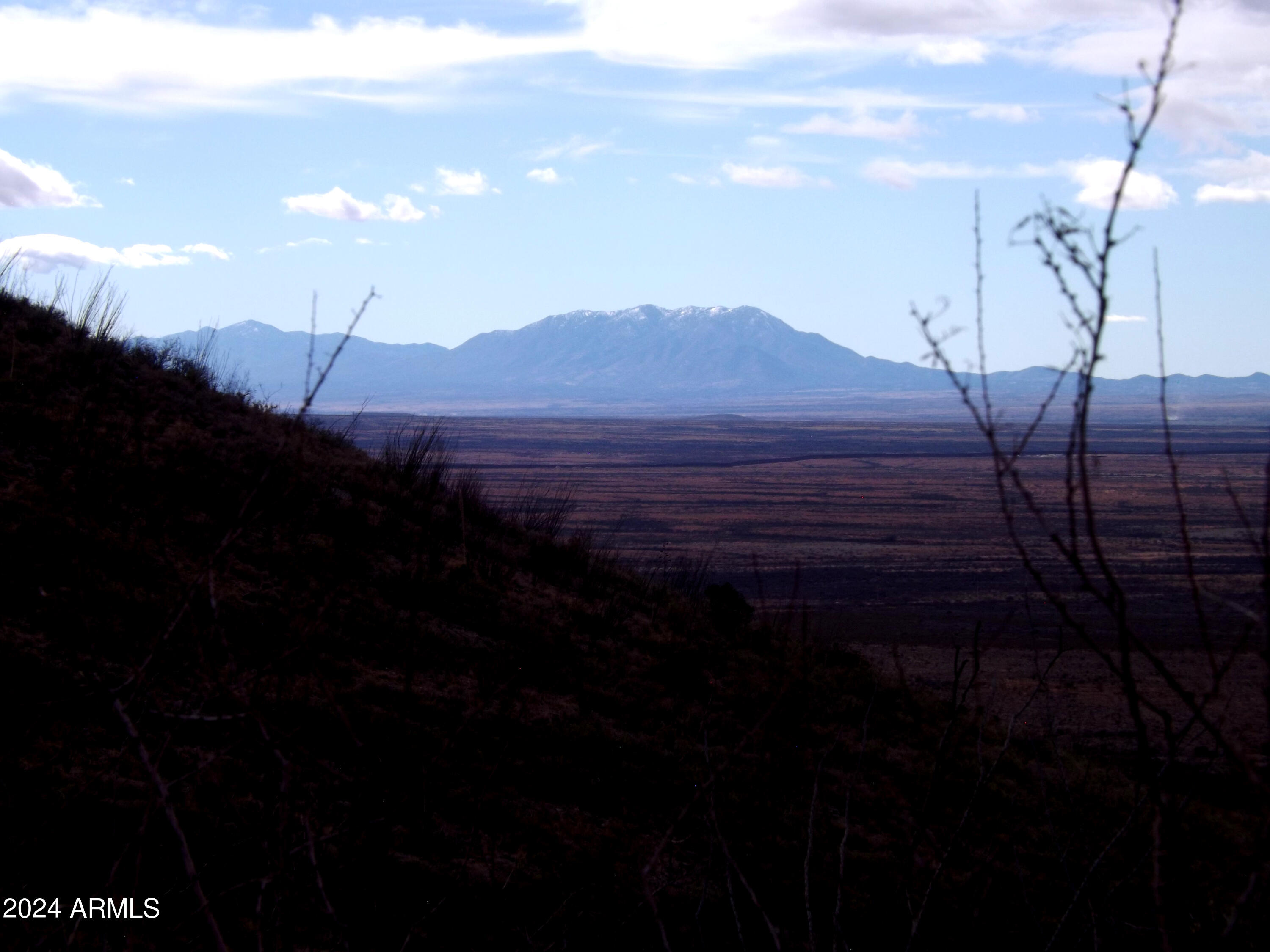 Lot 2 West Red Mountain Road, Unit 2 Bisbee, AZ 85603 - Photo 10 of 14 a view of a backyard of a house with a mountain