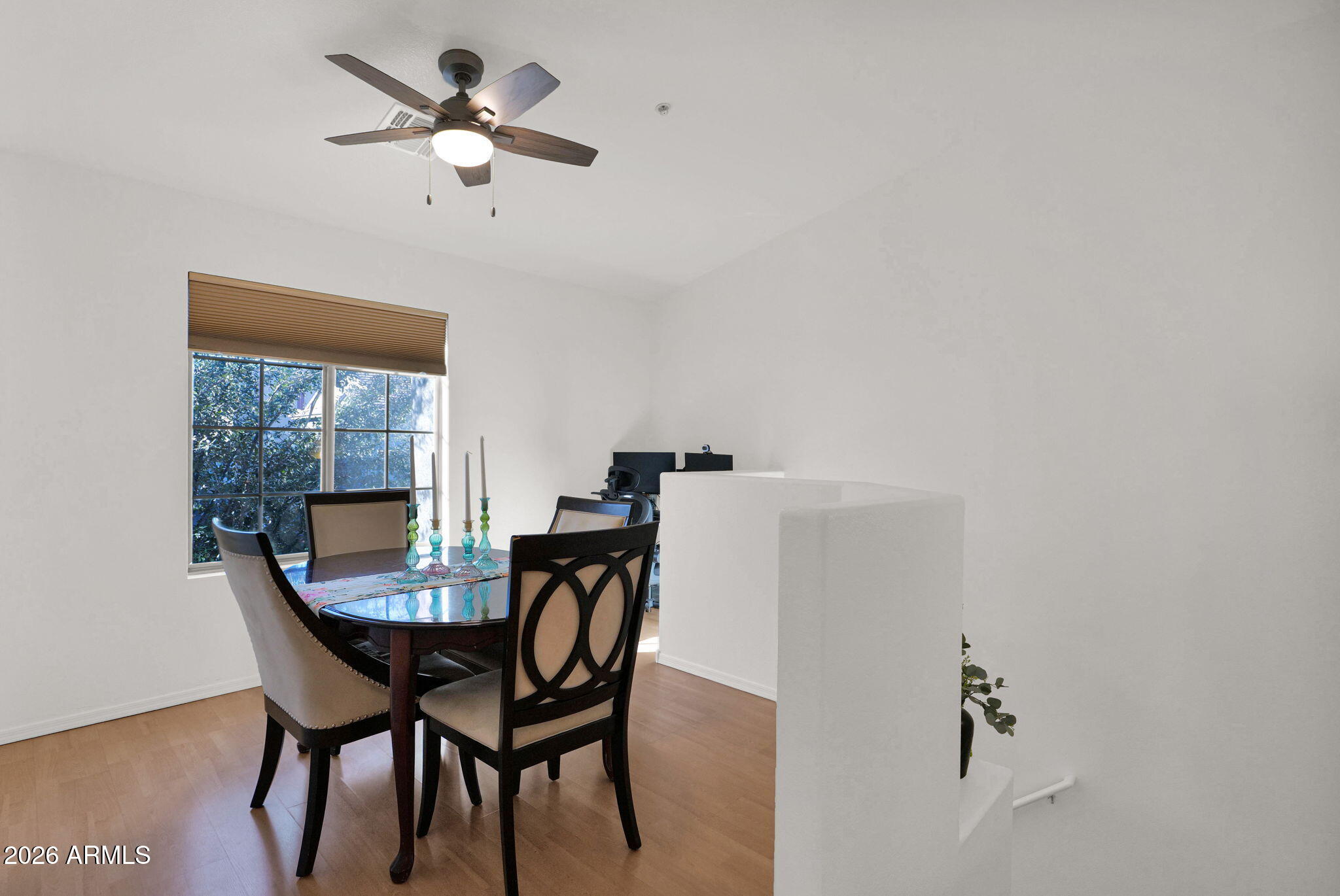 2402 East 5th Street, Unit 1646 Tempe, AZ 85288 - Photo 11 of 37 a dining room with furniture and window