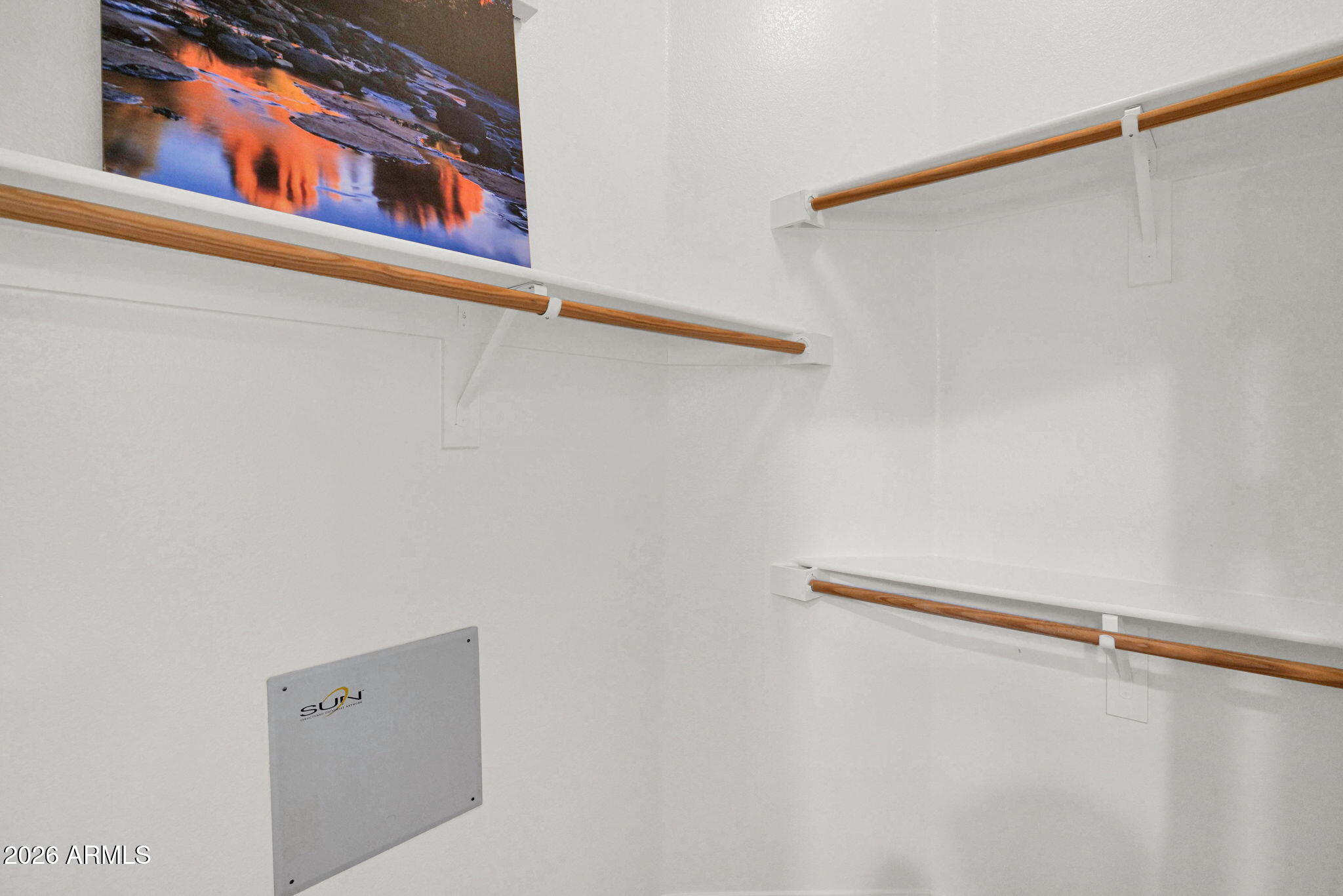 2402 East 5th Street, Unit 1646 Tempe, AZ 85288 - Photo 15 of 37 a view of a room with rack on the wall