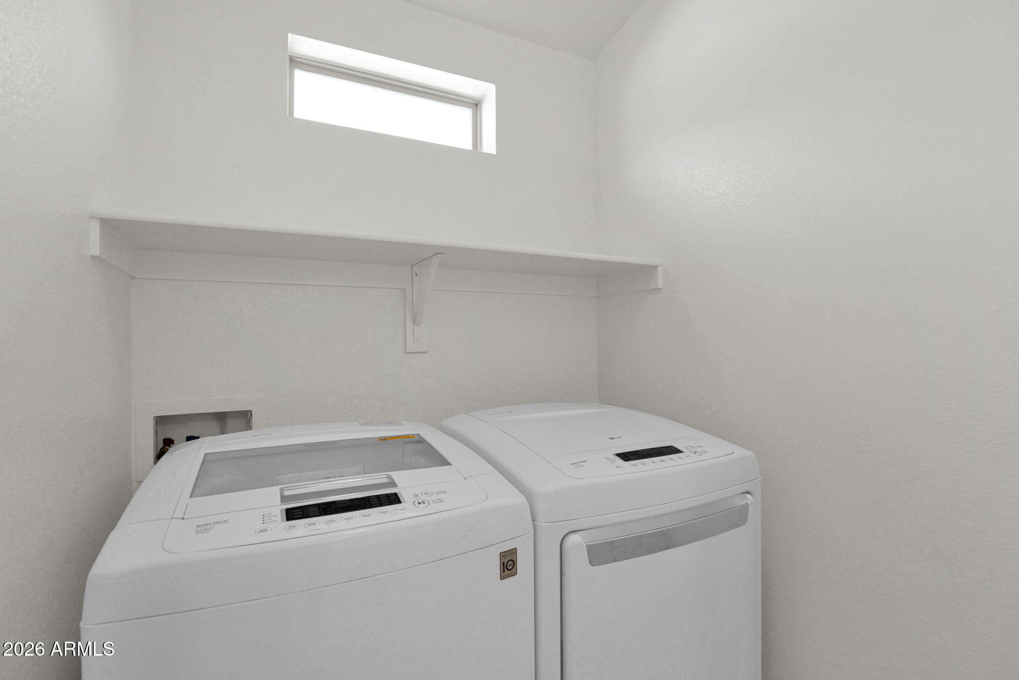 2402 East 5th Street, Unit 1646 Tempe, AZ 85288 - Photo 32 of 37 a utility room with dryer and washer