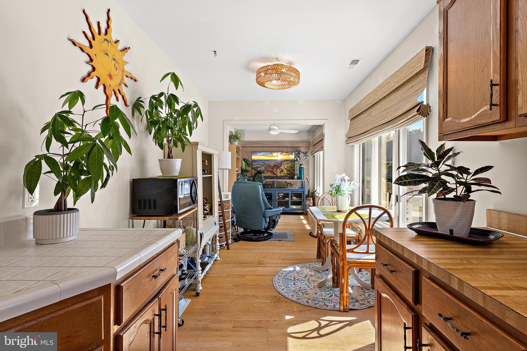 37 Fir Road Manahawkin, NJ 08050 - Photo 15 of 40 a kitchen with a table and chairs in it