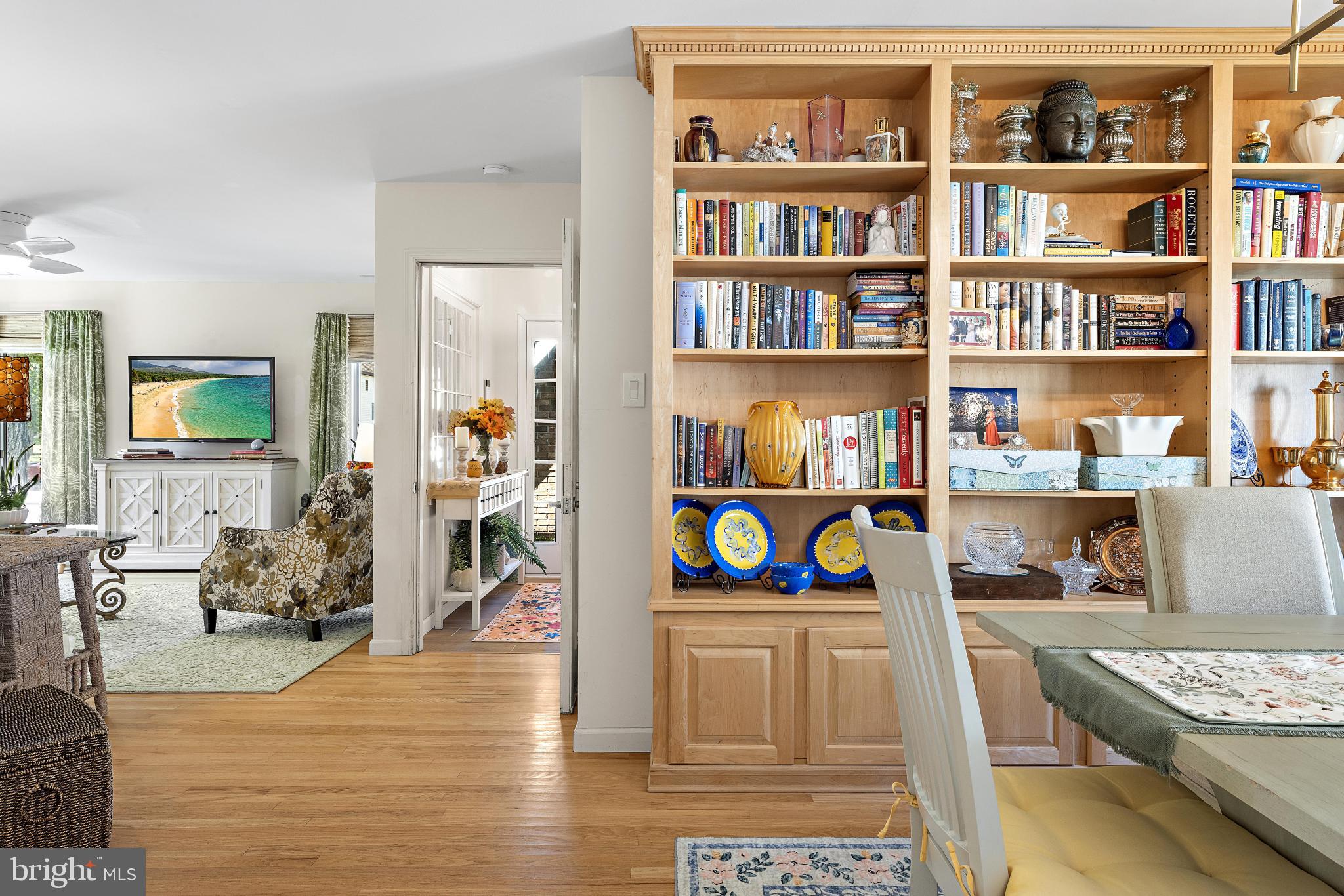 37 Fir Road Manahawkin, NJ 08050 - Photo 20 of 40 a living room with furniture and a book shelf