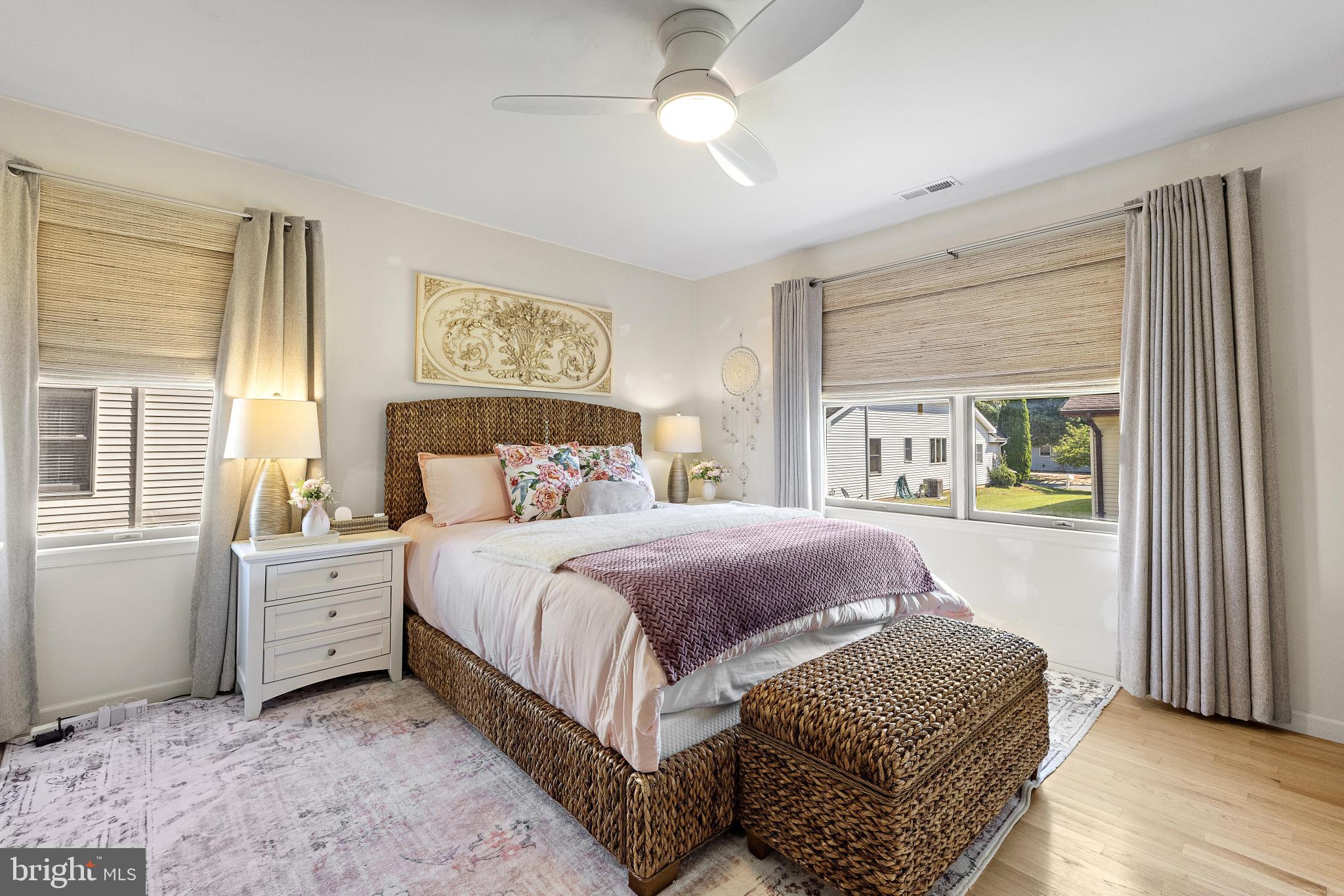 37 Fir Road Manahawkin, NJ 08050 - Photo 23 of 40 a bedroom with a large bed and a window