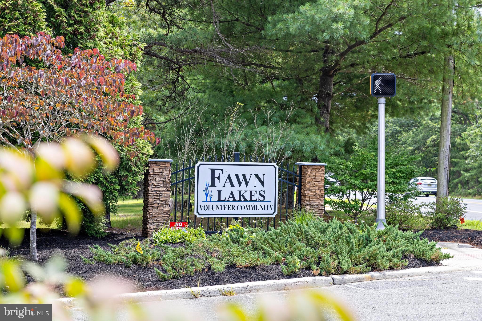 37 Fir Road Manahawkin, NJ 08050 - Photo 34 of 40 a sign on the side of a road