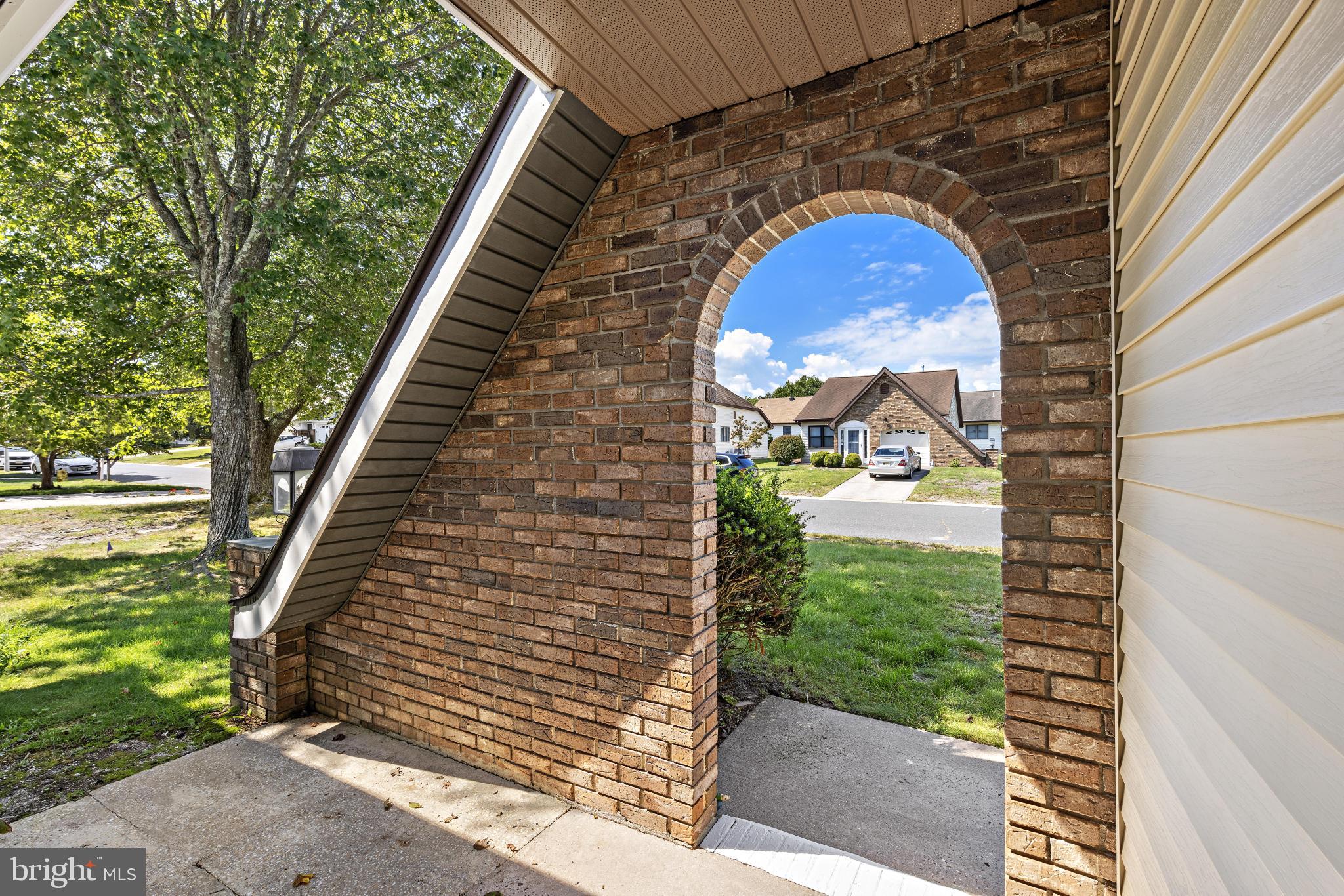 37 Fir Road Manahawkin, NJ 08050 - Photo 5 of 40 a view of swimming pool with a garden