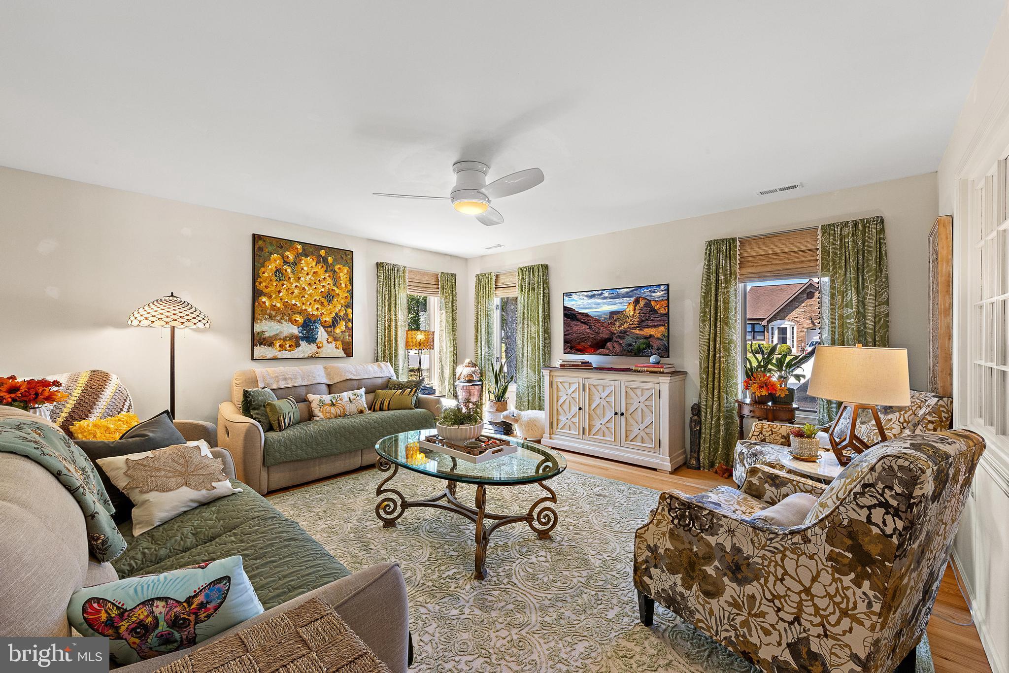37 Fir Road Manahawkin, NJ 08050 - Photo 8 of 40 a living room with furniture and a flat screen tv
