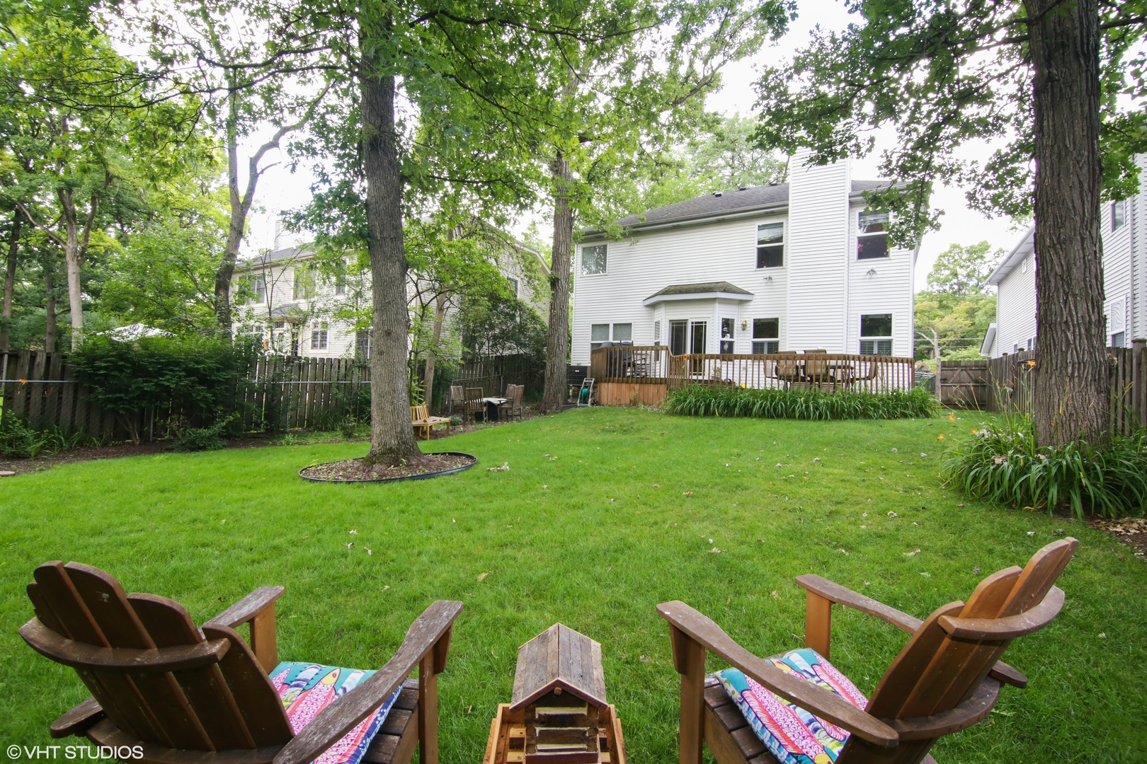 317 Ridge Road Highland Park, IL 60035 - Photo 22 of 26 a front view of a house with garden and a sitting area