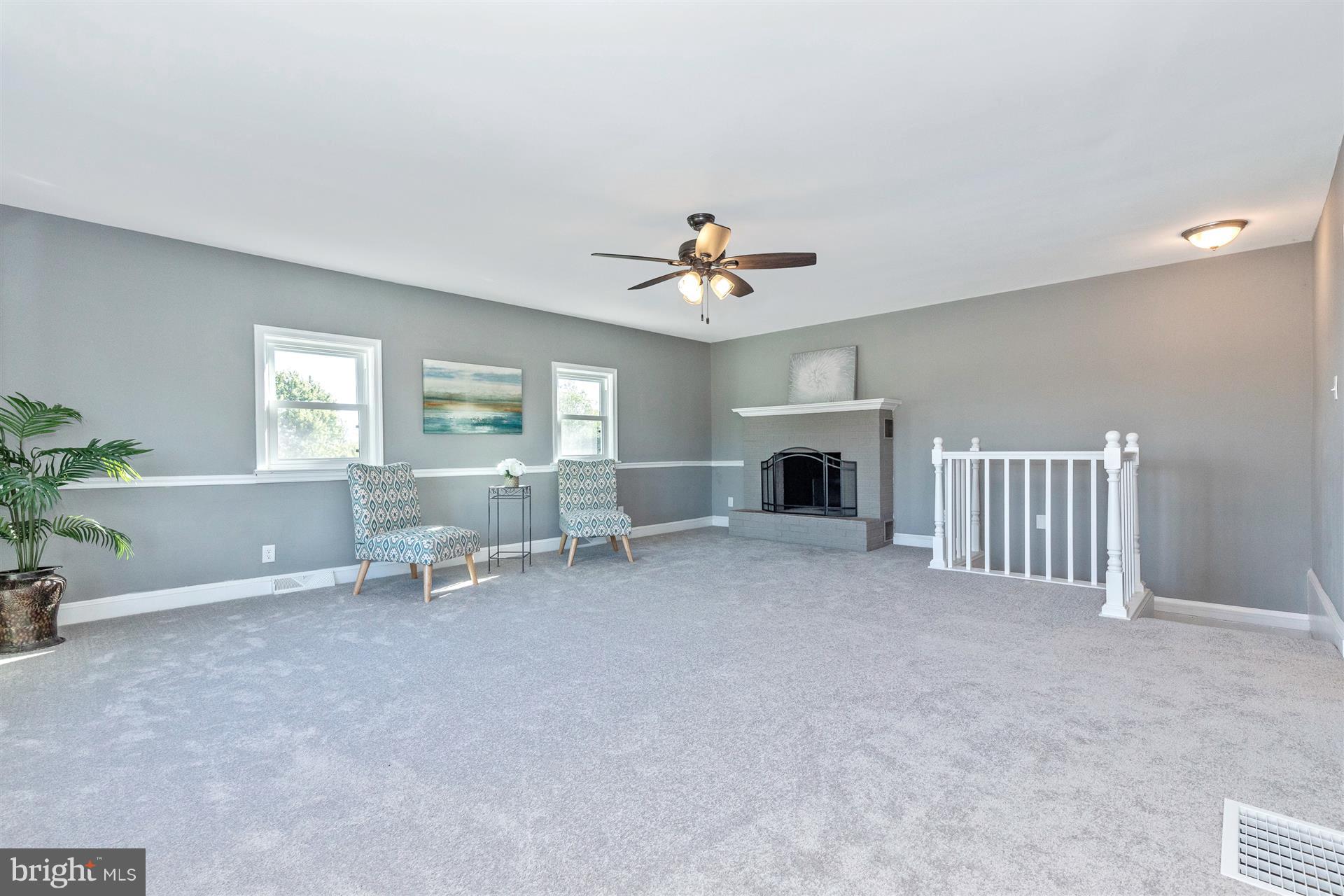 10133 Rocky Ridge Road Rocky Ridge, MD 21778 - Photo 14 of 36 Large family room with wood burning fireplace.