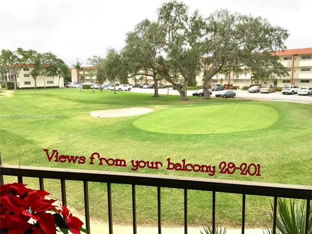 a view of a street with an ocean view