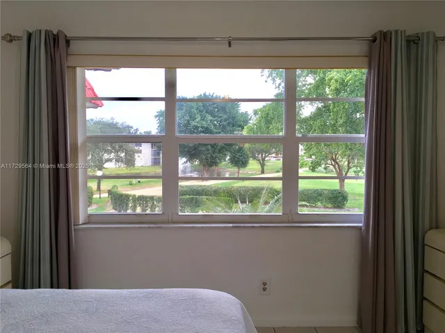 a view of a balcony with an outdoor space