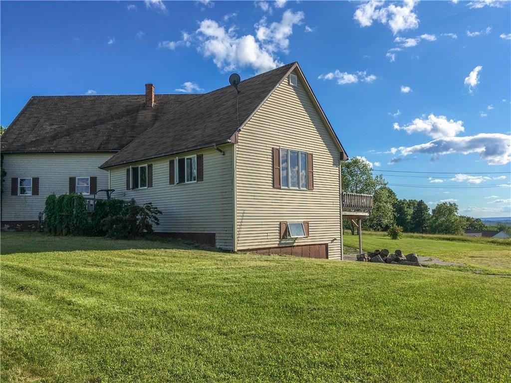 552 Enfield Road Lincoln, ME 04457 - Photo 29 of 35 View of home from corner of lot.