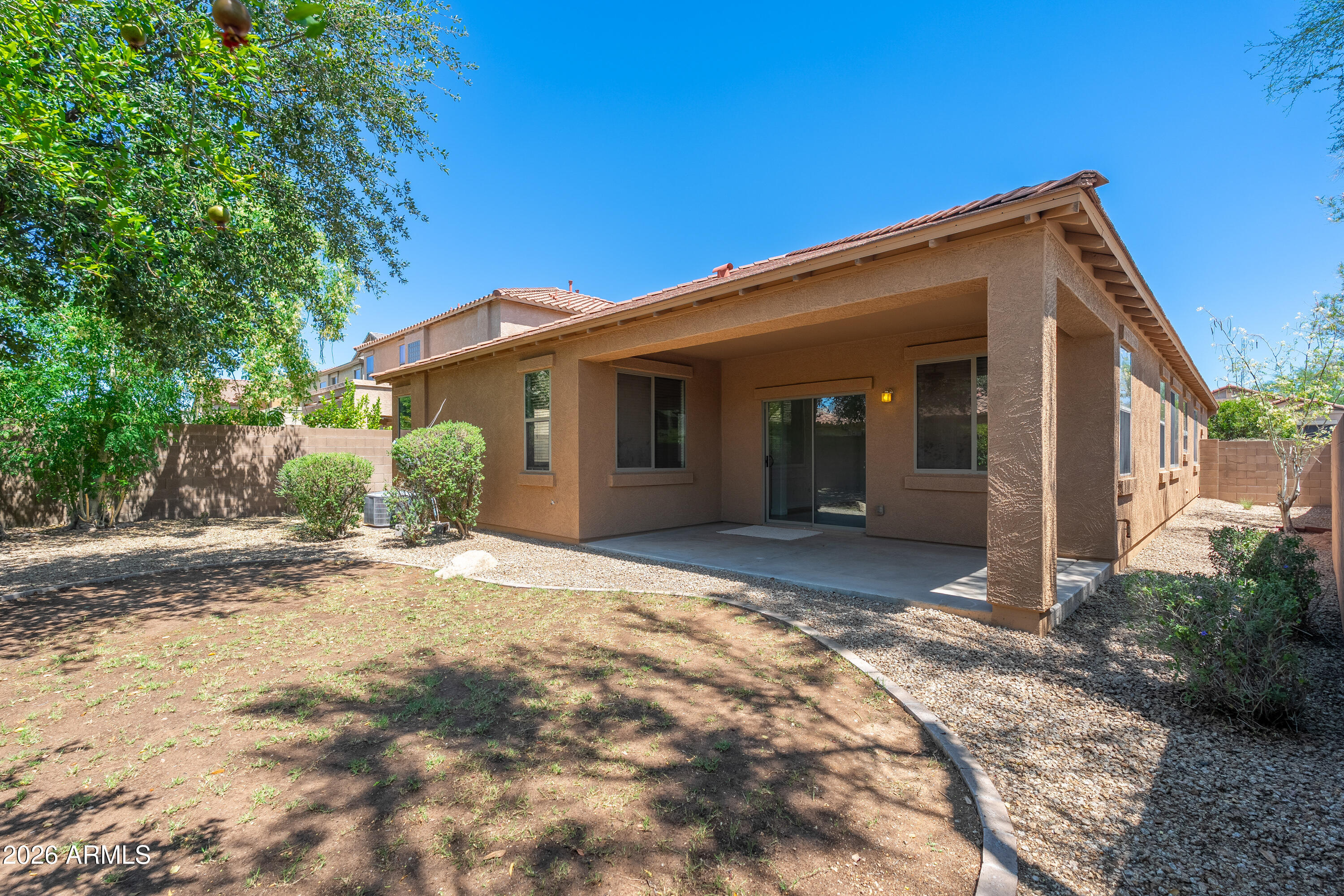 4317 East Folgers Road Phoenix, AZ 85050 - Photo 27 of 40 a view of a house with a yard