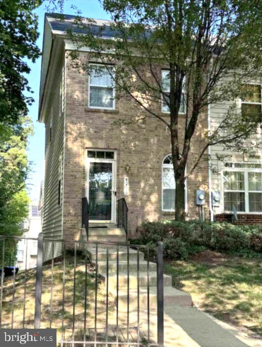 a brick building with a large windows