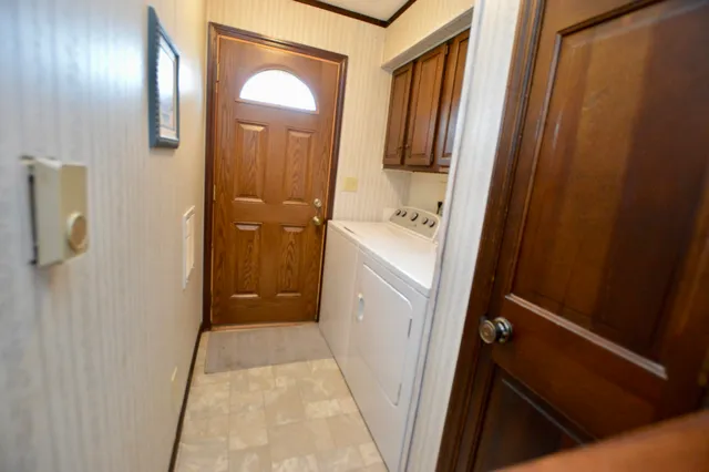 a bathroom with a sink a mirror and shower