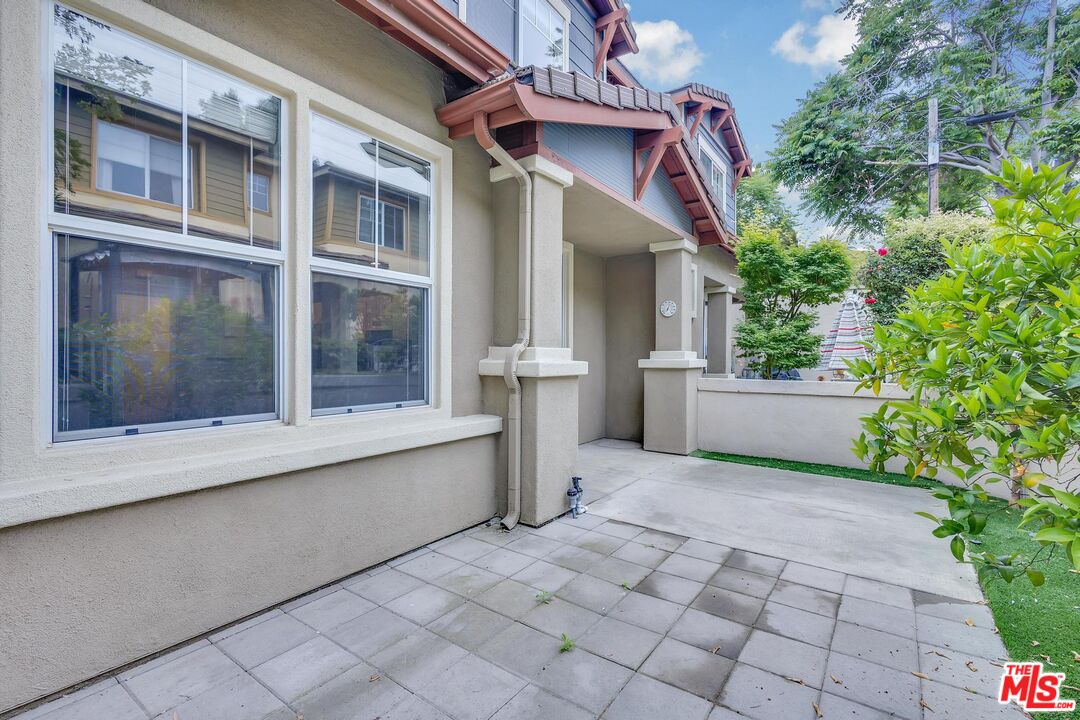 1131 Rosewalk Way Pasadena, CA 91103 - Photo 14 of 42 a view of white house with a large windows