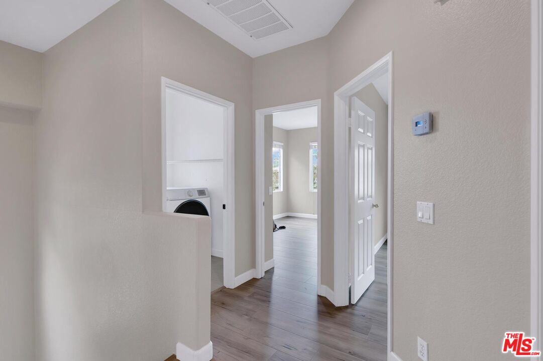 1131 Rosewalk Way Pasadena, CA 91103 - Photo 21 of 42 wooden floor with white walls