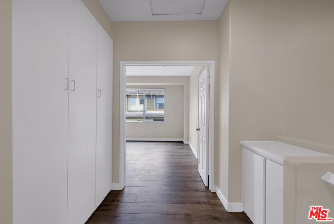 1131 Rosewalk Way Pasadena, CA 91103 - Photo 23 of 42 a view of a hallway with wooden floor