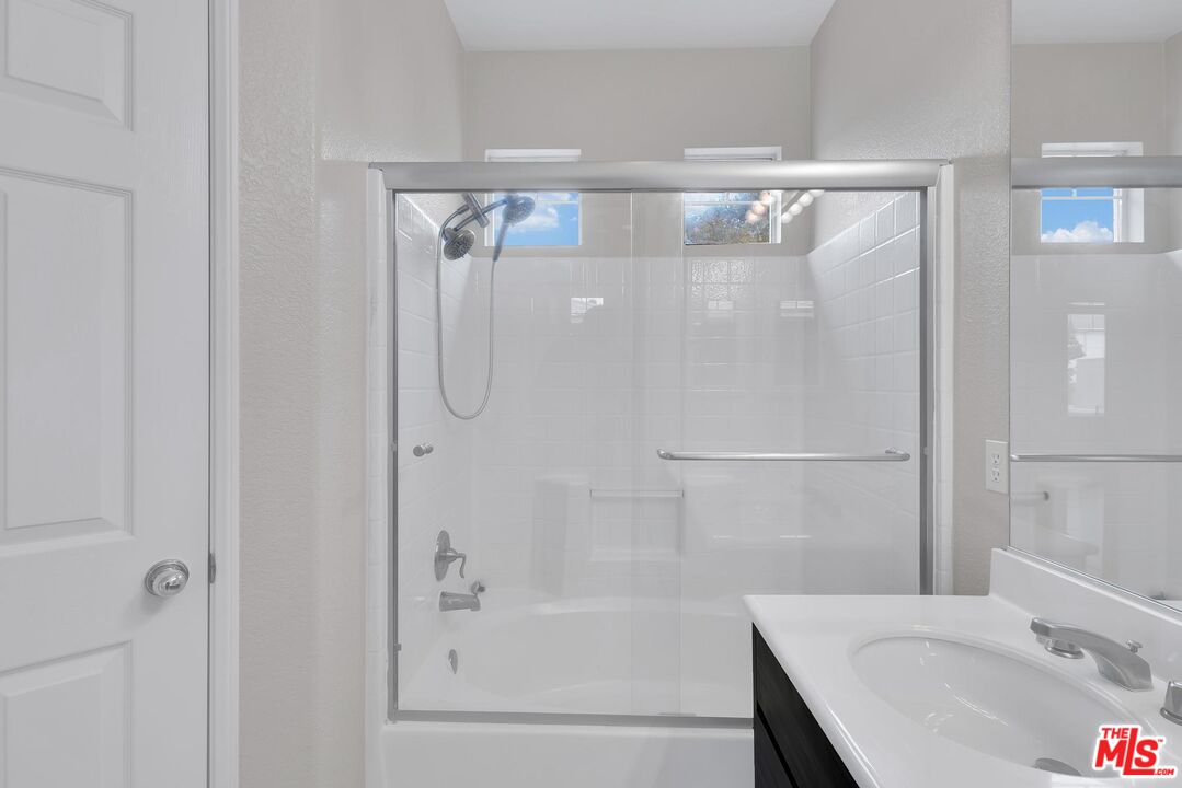 1131 Rosewalk Way Pasadena, CA 91103 - Photo 28 of 42 a bathroom with a shower and a sink