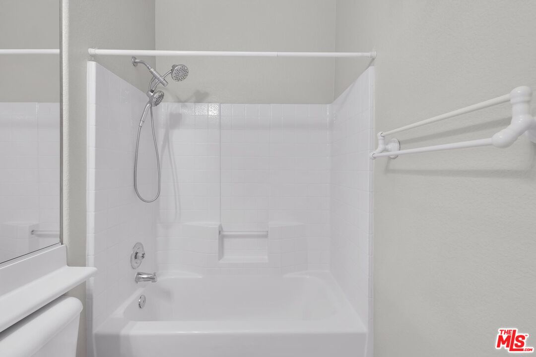 1131 Rosewalk Way Pasadena, CA 91103 - Photo 31 of 42 a bathroom with a shower and a bath tub