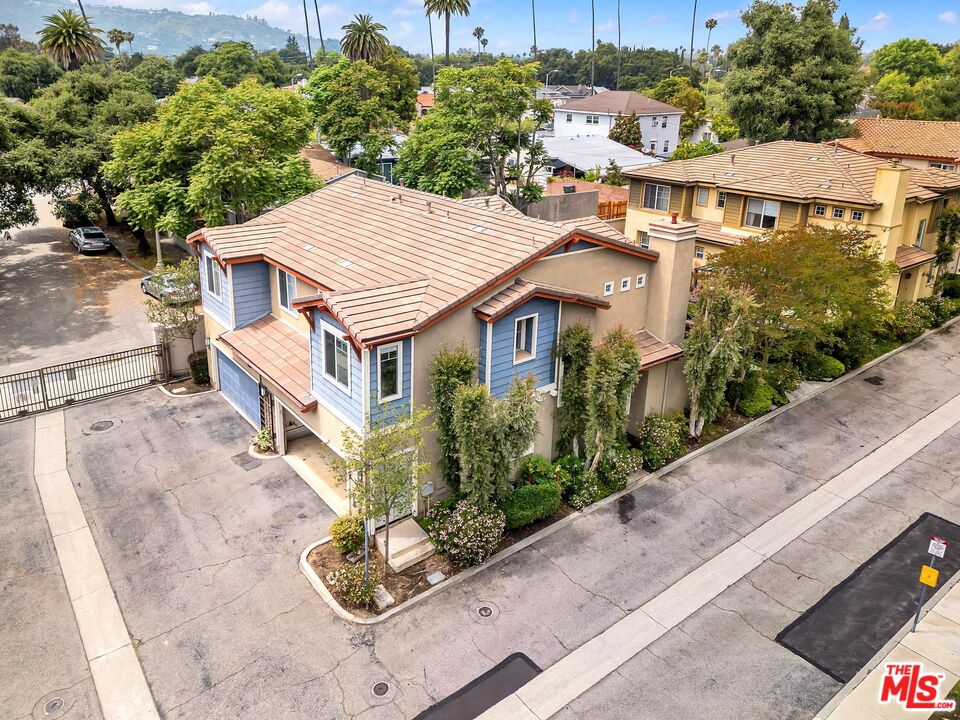 1131 Rosewalk Way Pasadena, CA 91103 - Photo 37 of 42 an aerial view of a house with a yard and potted plants